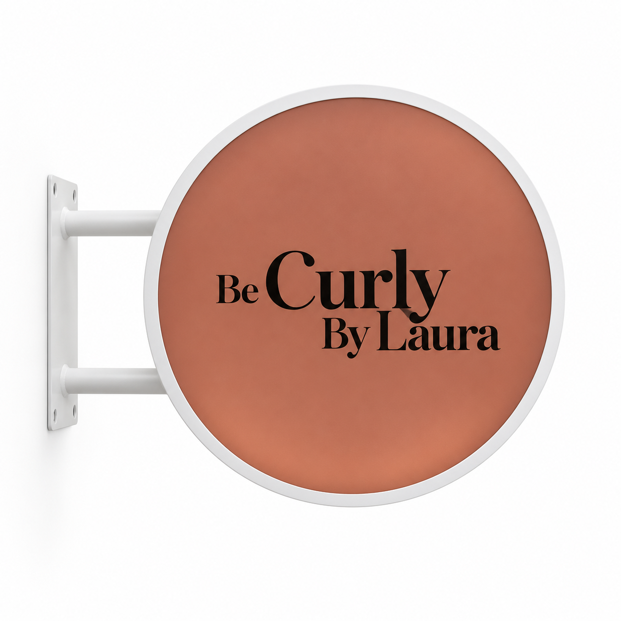 Be Curly By Laura 40 cm round LED sign with a white frame and peach artwork on a white background